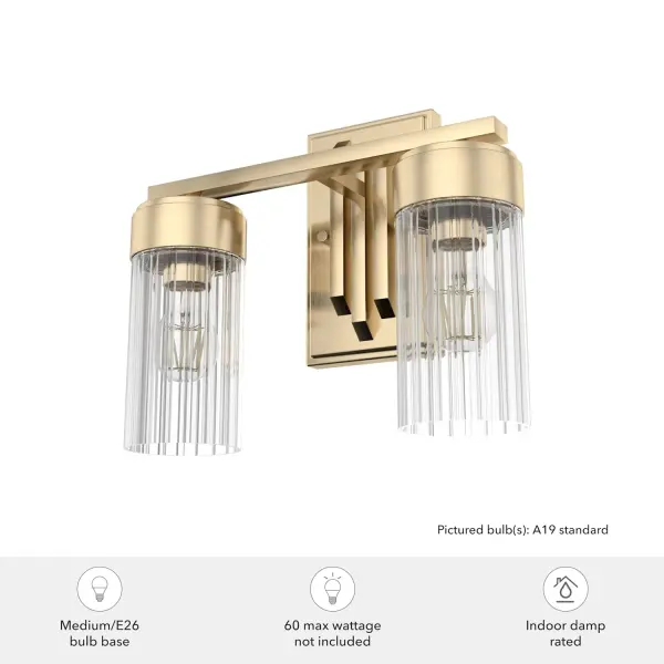 The Gatz vanity light brings sophisticated glamour to bathroom spaces with its Alturas Gold finish and fluted glass covers. The compact two-light design provides excellent task lighting while adding a sparkling aesthetic that elevates powder rooms and bathrooms. - alternate view