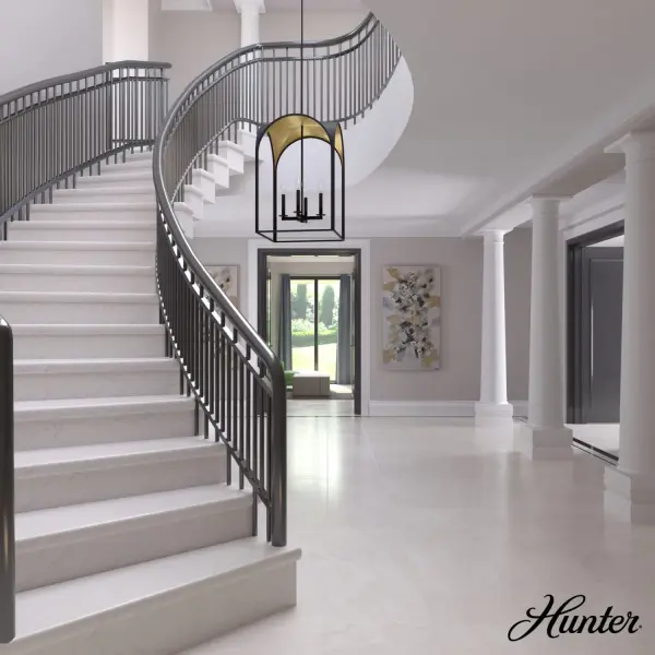 The Dukestown pendant combines architectural elegance with functional lighting through its distinctive arched frame design. The contrast between the black iron exterior and luminous metallic interior creates visual depth and warmth, making it an ideal statement piece for entryways and dining spaces. - alternate view