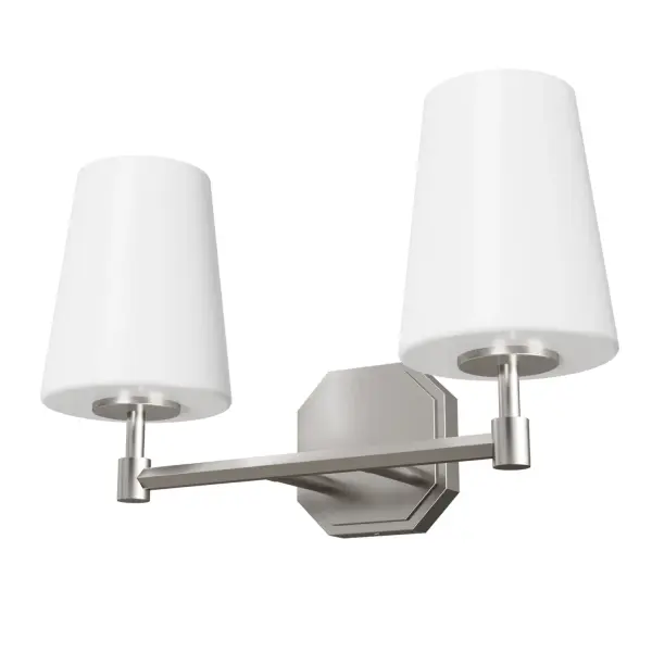 The Nolita vanity light delivers refined bathroom illumination with its brushed nickel finish and cased white glass shades. Perfect for powder rooms and bathrooms seeking a glamorous yet understated aesthetic.