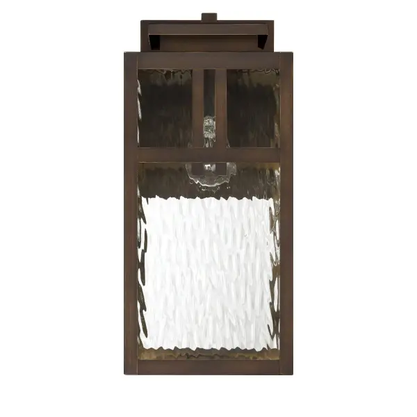 Elevate your curb appeal with the Aspenbrook Outdoor WeatherMax® Large Wall Light. Designed to withstand coastal climates, its WeatherMax® rating ensures long-lasting performance in the elements. The mission-inspired silhouette paired with rippled water glass casts a warm, inviting glow—perfect for entryways, patios, or porches. Its transitional design bridges classic and contemporary styles, bringing refined structure and effortless charm to your outdoor lighting. Fits one 60W bulb or LED equivalent (bulb not included). WeatherMax® Rated for outdoor or indoor use. Down Mount Only Mission-inspired design with timeless lines. Textured water glass for soft, artisan light. WEATHERMAX® RATED: Specifically designed for outdoor use, ensuring durability in various coastal weather conditions. BUILT TO LAST: Constructed with corrosion-resistant aluminum and stainless steel hardware for enhanced strength, durability, and performance in harsh outdoor environments. BULB RECOMMENDATION: Maximum 60W per light bulb or equivalent LED bulb. Bulbs not included. MISSION STYLE: Classic mission-style lines bring a timeless, architectural touch to your exterior spaces—balancing structure with understated style. WATER GLASS: Textured water glass diffuses light beautifully, casting a soft glow while adding artisanal character to your outdoor lighting. TRANSITIONAL: The transitional style celebrates natural light and a relaxed feel with smooth, blending details that create warm yet modern spaces with the best of both worlds; elegant, minimal and adaptable. DIMENSIONS: Measures 17" tall by 7.5" wide, extending 9.5" from the wall—perfectly scaled for porches, patios, or entryways. WARRANTY: One-year limited warranty backed by the trusted experts at Hunter.