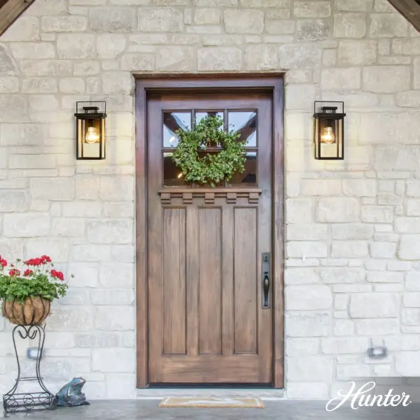 The Timbergrove outdoor wall light combines transitional elegance with modern minimalism. Its showcase-style design highlights decorative bulbs while the matte black finish and clean lines add sophisticated curb appeal. - alternate view