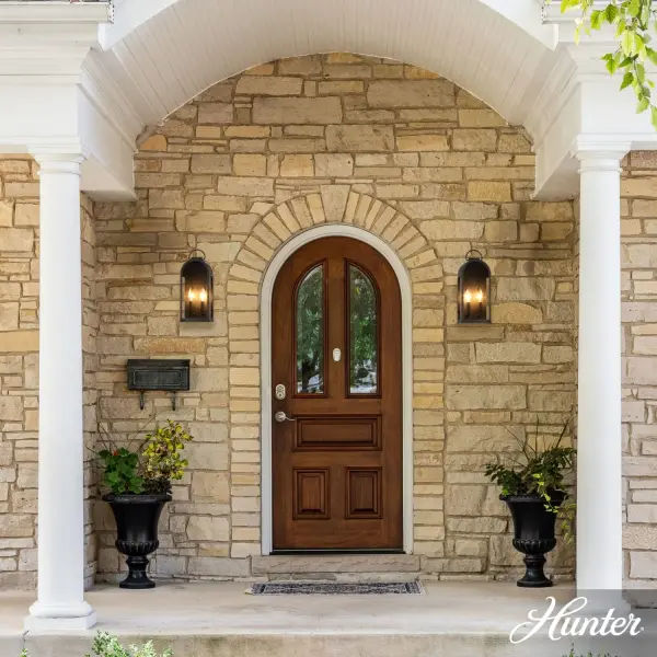 The Kendra Bell delivers reliable outdoor lighting in a space-saving design. Its WeatherMax technology ensures durability through all seasons, while the transitional style with subtle modern curves fits seamlessly into various architectural settings. - alternate view
