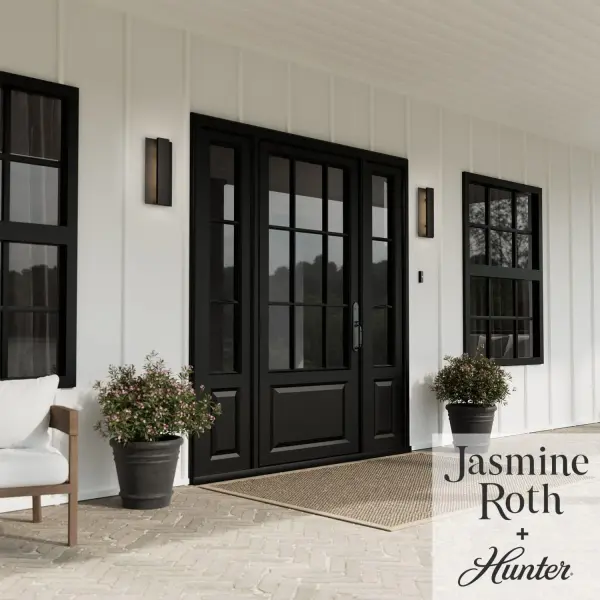 The Canoga LED Wall Mount combines clean modern design with WeatherMax durability. Designed by Jasmine Roth, this corrosion-resistant fixture features integrated LED lighting and a sleek matte black finish perfect for contemporary exteriors. - alternate view
