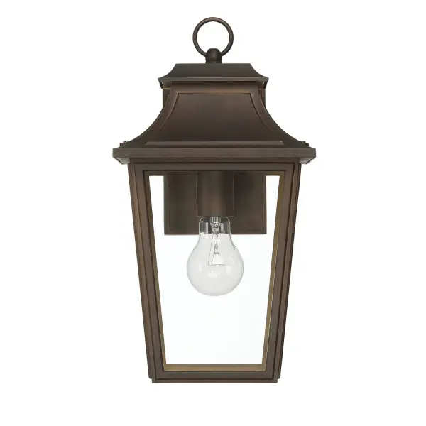 Elevate your home's curb appeal with the Spring Cove Outdoor 1 Light Medium Wall Light in Black. Its traditional design layers rich color and texture, bringing timeless character to your exterior. Wet-rated for year-round performance, this fixture stands up to even the harshest weather. Crafted from premium aluminum, it resists corrosion while maintaining its stylish finish for years to come. Perfect for illuminating entryways, patios, or walkways, the Spring Cove combines enduring beauty with reliable outdoor lighting—making your space as inviting as it is secure. Rated for indoor or outdoor use. Requires 1 E26 bulbs (not included). Down Mount Only TRADITIONAL: History, glamour, layering. WET-RATED: For use in outdoor spaces exposed to extreme weather elements. BULB RECOMMENDATION: Maximum 60 W per light bulb or equivalent LED bulb. Bulbs not included. TRADITIONAL: Layering color and texture, traditional design brings a sense of history and glamour to a space. ALUMINUM CONSTRUCTION: Crafted from high-quality aluminum, this fixture is built to withstand the elements while maintaining its stylish finish—perfect for reliable, long-term outdoor use. BUILT TO LAST: Constructed with corrosion-resistant aluminum and stainless steel hardware for enhanced strength, durability, and performance in harsh outdoor environments. DIMENSIONS: Measures 15" tall by 8" wide, extending 9.25" from the wall—perfectly scaled for porches, patios, or entryways. WARRANTY: One-year limited warranty backed by the trusted experts at Hunter. - alternate view