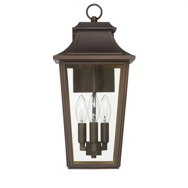 Make a bold statement with the Spring Cove Outdoor 3 Light Large Wall Light in Black. Showcasing a traditional design with rich textures and timeless charm, this fixture enhances your home's exterior with classic elegance. Built for the elements, it's wet-rated to withstand rain, snow, and humidity without compromise. The high-quality aluminum construction ensures lasting durability and a refined finish season after season. With three lights for maximum illumination, it's ideal for brightening expansive entryways, patios, or outdoor entertaining areas—bringing beauty, security, and lasting performance to your space. Rated for indoor or outdoor use. Requires 3 E12 bulbs (not included). Down Mount Only TRADITIONAL: History, glamour, layering. WET-RATED: For use in outdoor spaces exposed to extreme weather elements. BULB RECOMMENDATION: Maximum 60 W per light bulb or equivalent LED bulb. Bulbs not included. TRADITIONAL: Layering color and texture, traditional design brings a sense of history and glamour to a space. ALUMINUM CONSTRUCTION: Crafted from high-quality aluminum, this fixture is built to withstand the elements while maintaining its stylish finish—perfect for reliable, long-term outdoor use. BUILT TO LAST: Constructed with corrosion-resistant aluminum and stainless steel hardware for enhanced strength, durability, and performance in harsh outdoor environments. DIMENSIONS: Measures 16.5" tall by 8" wide, extending 9.5" from the wall—perfectly scaled for porches, patios, or entryways. WARRANTY: One-year limited warranty backed by the trusted experts at Hunter. - alternate view