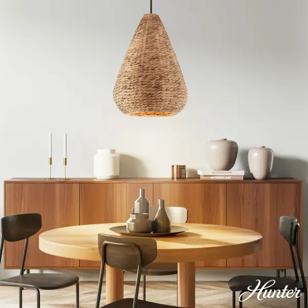 The Cambria pendant masterfully blends natural texture with modern simplicity. Its handwoven seagrass shade creates beautiful light diffusion while the matte black hardware adds contemporary contrast. A versatile statement piece that works equally well in coastal, farmhouse, or modern organic interiors. - alternate view
