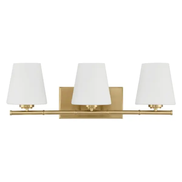 The Fauna Grove vanity brings biophilic design to your bathroom with bamboo-inspired detailing and elegant cone shades. The Alturas Gold finish adds warmth while cased white glass provides soft, flattering illumination perfect for grooming tasks.