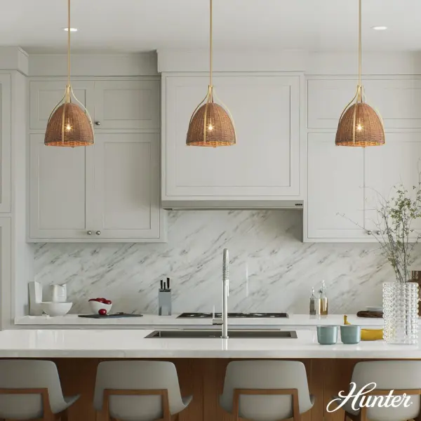 The Arcelia pendant delivers casual modern elegance with its Alturas Gold finish and cased white glass shade. At 12 inches wide, it's perfectly sized for kitchen islands, breakfast nooks, or bedside lighting. The warm gold tone adds sophistication while the white glass provides soft, diffused illumination. - alternate view