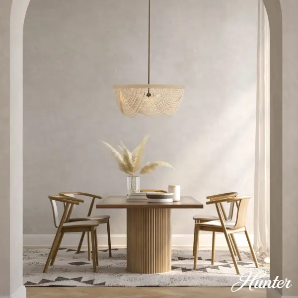 The Autumndale chandelier brings organic warmth to modern spaces with its cascading wood bead design and matte bronze finish. Perfect for creating a relaxed yet sophisticated atmosphere over dining tables and islands. - alternate view