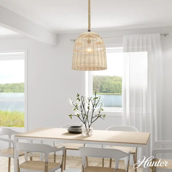 The Baskel Pendant delivers organic warmth through its handwoven rattan shade and rope-hung cord. Its basket-inspired silhouette adds natural texture while maintaining clean, transitional lines that work in both contemporary and relaxed interiors. - alternate view