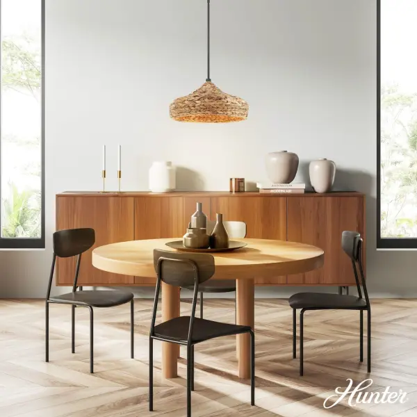 The Cambria pendant combines organic texture with clean modern lines, making it a versatile choice for transitional interiors. The natural seagrass shade creates warm, diffused light while the matte black hardware adds contemporary contrast. - alternate view