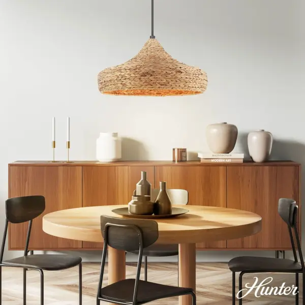 The Cambria pendant brings organic warmth to contemporary spaces with its handwoven seagrass shade and clean matte black hardware. At 24 inches wide, it makes a substantial statement while maintaining an airy, approachable feel. - alternate view