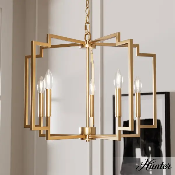The Zoanne chandelier delivers sophisticated modern style with its clean-lined geometric frame and luxurious Alturas Gold finish. Perfect for creating upscale ambiance in dining rooms and entryways, it balances formal elegance with contemporary simplicity. - alternate view