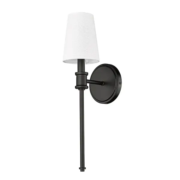 This versatile wall sconce pairs a soft white linen shade with a contemporary matte black finish, creating a timeless look that works in both traditional and modern spaces. Perfect for ambient lighting in bedrooms, hallways, or bathrooms.