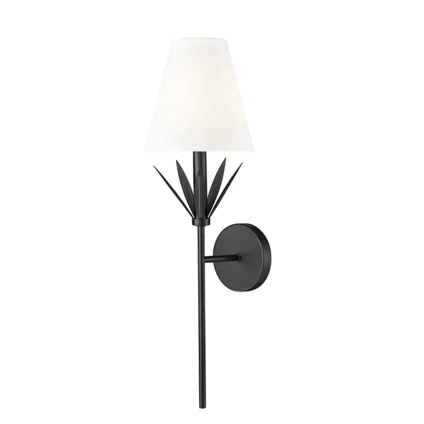 This transitional wall sconce features a white linen fabric shade paired with a matte black finish, creating a sophisticated contrast. Perfect for adding warm, diffused light to bedrooms, hallways, and living spaces.