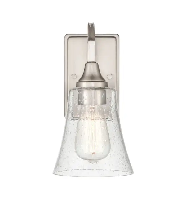 The 2101 wall sconce in brushed nickel offers a clean, timeless aesthetic that complements both contemporary and traditional interiors. Its neutral metallic finish provides versatile styling options.