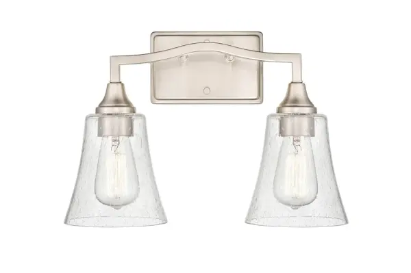 The 2102 vanity light offers timeless transitional styling with a versatile brushed nickel finish. Perfect for bathroom vanities, this fixture provides functional task lighting with understated elegance.