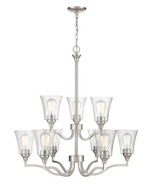 The 2119 chandelier in brushed nickel offers a refined transitional design that complements both traditional and contemporary interiors. Its neutral metallic finish provides versatility across various décor styles.