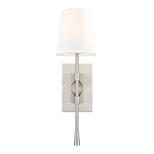 This transitional wall sconce features a white linen shade that provides warm, ambient lighting. The brushed nickel finish offers versatility to complement various décor styles from traditional to contemporary.