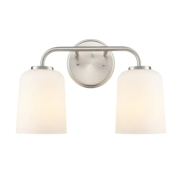 A versatile bath vanity fixture in timeless brushed nickel finish that complements both traditional and contemporary bathroom designs. Ideal for providing functional task lighting at the mirror.