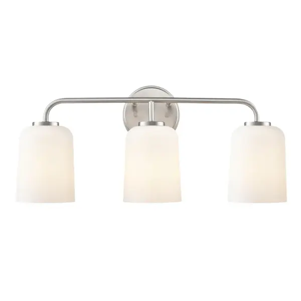 A versatile bath vanity light featuring a timeless brushed nickel finish that complements both traditional and contemporary bathroom designs. Ideal for providing functional task lighting at the mirror.