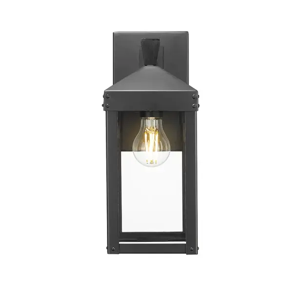 This outdoor wall light features a powder coated black finish designed for durability and weather resistance. Its contemporary styling complements modern exteriors while providing reliable illumination.
