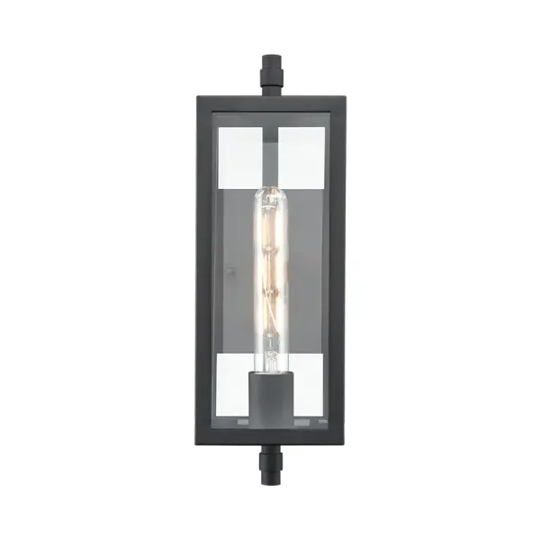 The 230001 outdoor light combines contemporary styling with a durable textured black finish, making it ideal for exterior applications. Its weather-resistant construction ensures long-lasting performance.
