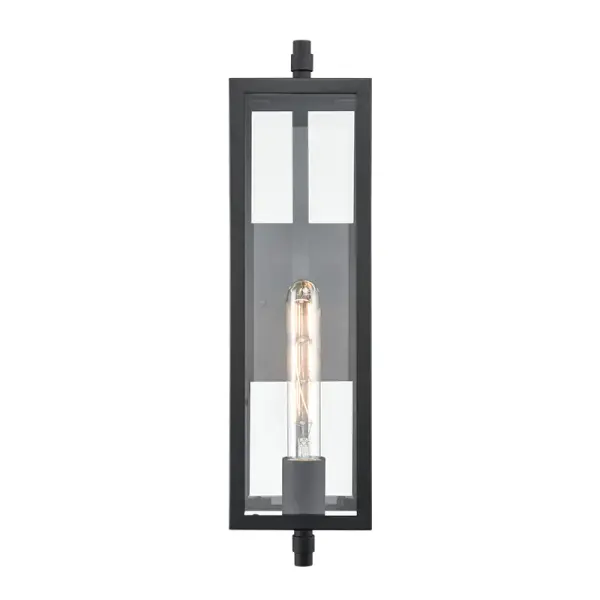 The 230101 outdoor light features a contemporary textured black finish designed for exterior applications. Its weather-resistant construction makes it suitable for patios, porches, and commercial outdoor spaces.