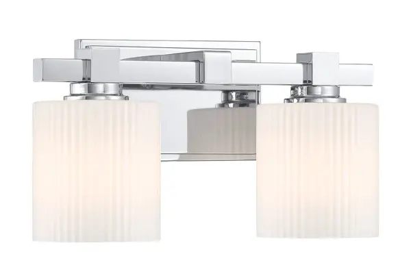 With polished chrome framing and finely ribbed white opal glass, the Abelson creates a crisp, graphic focal point in the bath. The 14‑inch, two‑light size suits half baths beautifully or can be doubled above dual‑sink vanities. Its dimmable, damp‑rated construction provides enduring, customizable illumination. Collection: Abelson Finish: Chrome Glass: Opal Ribbed Width: 14.00" Height: 7.75" Weight: 4.03 lb Extension from Wall: 6.00" Wire: 7" Canopy: 7.9"x4.7" Number of Bulbs: 2 Maximum Wattage: 60.00 W Bulb Type: A19 Bulb Base: E26 Medium Light Source: Incandescent Dimmable Voltage: 120.00 V Material: Steel,Glass Country of Origin: Vietnam Safety Listing: ETL Safety Rating: Damp Connection: Hardwired Manufacturer Warranty: 1 year-limited manufacturer's warranty. Spec Sheet Instructions