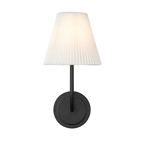 This versatile wall sconce pairs a soft white fabric shade with a contemporary matte black finish, creating ambient lighting perfect for bedrooms, hallways, and living spaces. The transitional design bridges traditional and modern aesthetics.