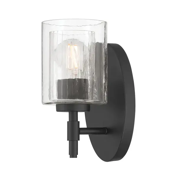 The Solventa wall sconce brilliantly combines vintage Victorian parlor aesthetics with modern design sensibility. Its innovative double glass shade—clear ribbed glass nested within vintage glass—creates a dazzling light effect perfect for task lighting while adding sophisticated style.