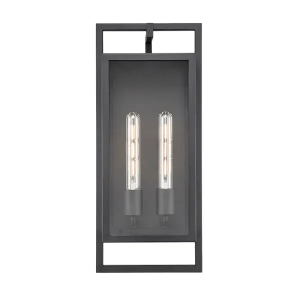 The 270102 outdoor light combines contemporary styling with a durable textured black finish, making it ideal for exterior applications. Its weather-resistant construction ensures long-lasting performance.