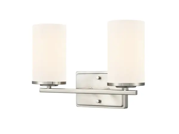 The Verlana 2-light vanity combines striking industrial design with Mid-Century Modern sophistication. Cylindrical glass shades and brushed nickel finish create a versatile fixture perfect for contemporary bathrooms.