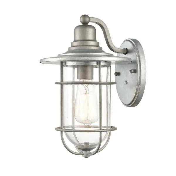 The 2921 features a galvanized metal finish that provides weather resistance and rustic charm. Perfect for outdoor spaces requiring durable, low-maintenance lighting with industrial character.