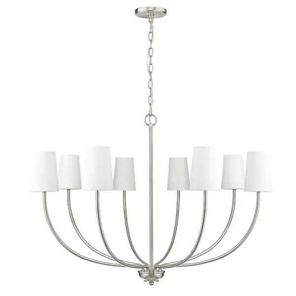 This brushed nickel chandelier combines classic elegance with contemporary simplicity. White fabric shades provide soft, diffused lighting while the brushed nickel finish adds refined sophistication to any space.