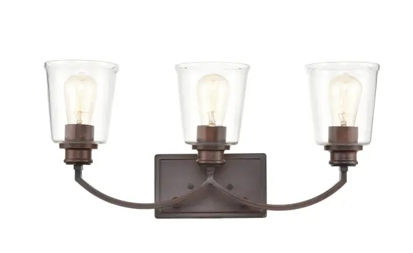 A traditional bronze vanity light fixture that brings timeless elegance to bathroom spaces. The warm bronze finish complements classic and transitional decor while providing essential task lighting.