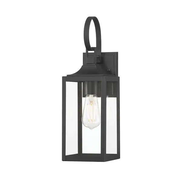 The Halston Collection blends old-world lantern charm with contemporary clean lines. Its powder-coated black finish and elongated profile create an elegant outdoor lighting solution with timeless appeal.