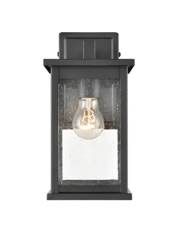 The 4101 outdoor light features a powder coated black finish designed for exterior applications. Its versatile design complements contemporary and modern architectural styles while providing reliable outdoor illumination.