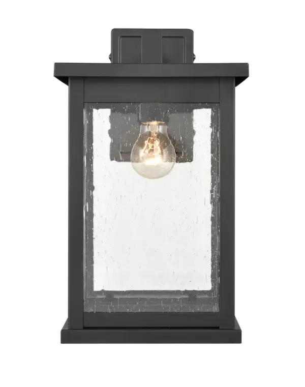 The 4121 outdoor light features a powder-coated black finish designed for exterior applications. Its weather-resistant construction and contemporary styling make it suitable for residential and commercial outdoor spaces.