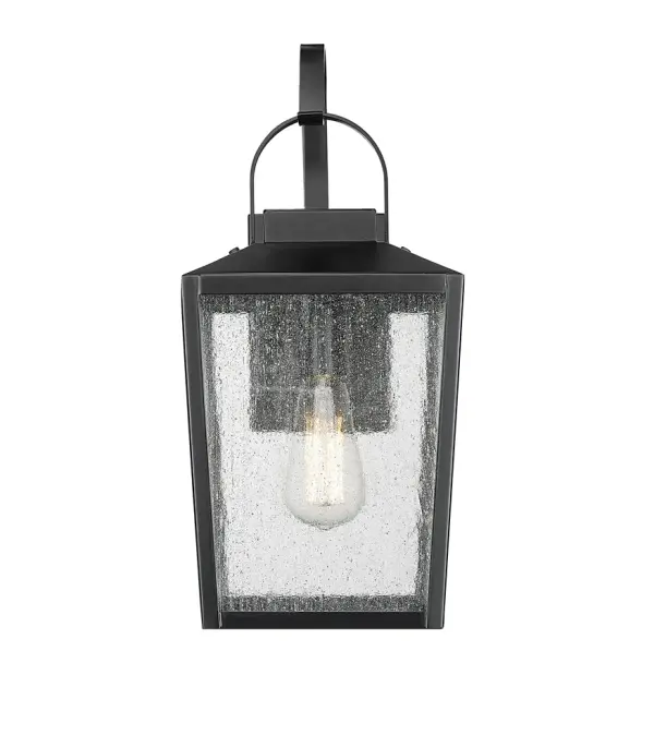 This outdoor wall sconce features a powder coated black finish designed for weather resistance and contemporary appeal. Ideal for illuminating exterior entryways, patios, and porches with modern style.