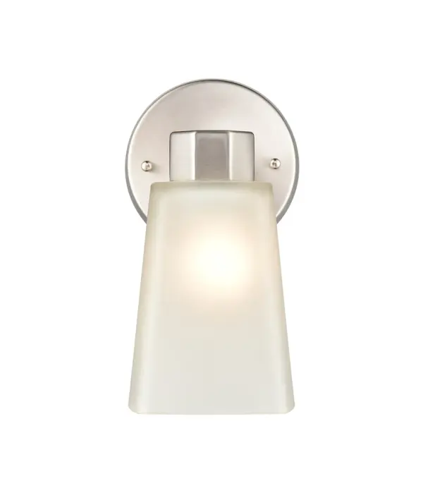 The 4271 wall sconce in brushed nickel offers a clean, transitional aesthetic that complements both contemporary and traditional interiors. Its neutral metallic finish provides versatile styling options.