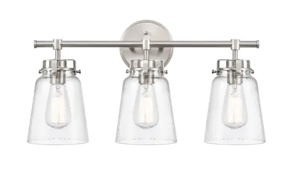 The 4413 vanity light offers a clean, transitional design in brushed nickel that complements a wide range of bathroom styles. Its wall-mounted configuration provides functional task lighting for grooming areas.