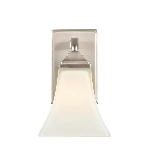 The 4501 vanity light combines transitional styling with a brushed nickel finish, making it an ideal choice for bathroom lighting. Its neutral metallic tone complements various design schemes while providing functional illumination.