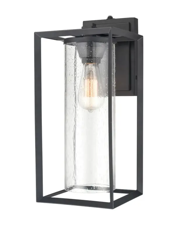 This outdoor wall sconce features a powder coated black finish designed for durability and weather resistance. Its contemporary styling complements modern exteriors while providing reliable outdoor illumination.