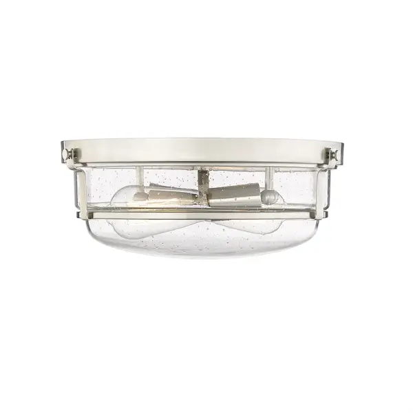 The 4652 flush mount offers clean, contemporary styling in a durable brushed nickel finish. Ideal for spaces with lower ceilings or where a streamlined look is desired, this fixture provides functional illumination without visual clutter.
