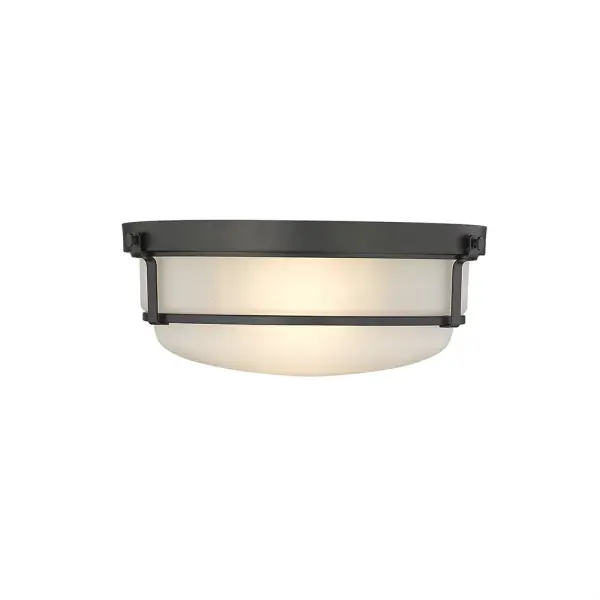 The 4662 flush mount delivers contemporary style with its clean matte black finish. Perfect for low-ceiling spaces, this fixture provides functional lighting while maintaining a minimalist aesthetic.