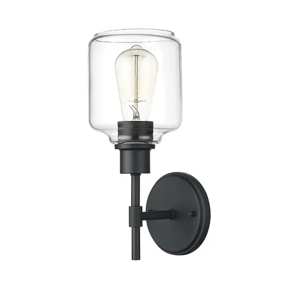 This contemporary wall sconce features a sophisticated matte black finish that complements modern and minimalist design schemes. Ideal for adding ambient lighting and architectural interest to hallways, bathrooms, and living spaces.