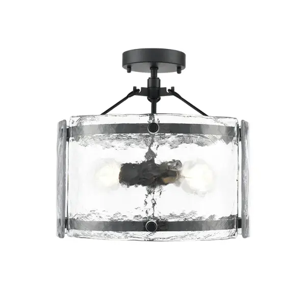 The 47002 semi-flush mount delivers contemporary style with its clean matte black finish. Ideal for spaces with lower ceilings, this fixture provides functional lighting while maintaining a modern aesthetic.