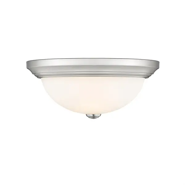 A practical flush mount ceiling fixture in brushed nickel finish that provides clean, contemporary lighting for rooms with standard ceiling heights. Ideal for bedrooms, hallways, and offices.