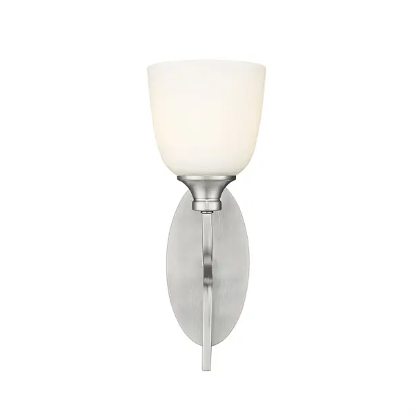 A classic wall sconce in brushed nickel finish that complements both contemporary and traditional interiors. Ideal for bathrooms, hallways, and bedrooms where reliable wall lighting is needed.